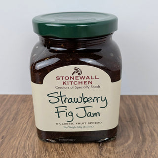 Stonewall Kitchen Gourmet Strawberry Fig Jam combines sweet strawberries with earthy figs for a rich, smooth spread. Perfect for toast, pastries, or cheese boards. Available at JSQ Mercantile – Women’s Boutique & Gift Shop in La Grange, IL.