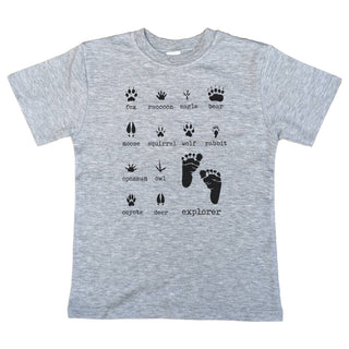 Gray t-shirt with black animal footprint designs and text on a white background