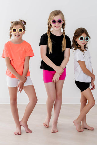 Toddler and young girls daisy sunglasses with floral frames in assorted colors, lightweight and playful design – JSQ Mercantile – a women’s boutique and gift shop in La Grange, IL.
