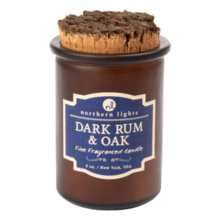 Dark Rum & Oak candle in glass vessel featuring a warm cocktail-inspired scent | JSQ Mercantile – a women’s boutique and gift shop in La Grange, IL.