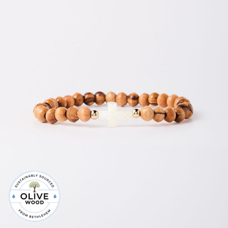 Holy Water Olive Wood Cross Bracelet handmade with olive wood beads from Bethlehem and resin cross infused with holy water from Lourdes, France | JSQ Mercantile – Women’s Boutique & Gift Shop in La Grange, IL