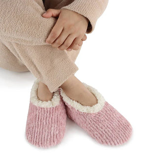 Women’s teddy bear faux fur slippers with memory foam sole on display – JSQ Mercantile – a women’s boutique and gift shop in La Grange, IL.