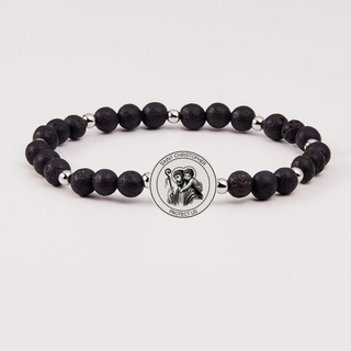 Men’s Holy Water St. Christopher Bracelet with lava rock and tiger’s eye beads infused with holy water from Lourdes, France | JSQ Mercantile – Women’s Boutique & Gift Shop in La Grange, IL