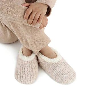Women’s teddy bear faux fur slippers with memory foam sole on display – JSQ Mercantile – a women’s boutique and gift shop in La Grange, IL.