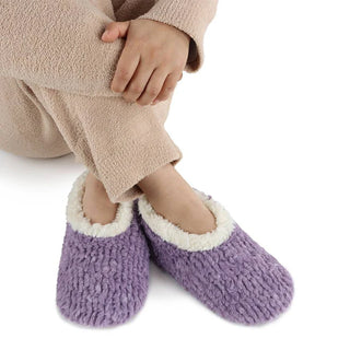 Women’s teddy bear faux fur slippers with memory foam sole on display – JSQ Mercantile – a women’s boutique and gift shop in La Grange, IL.